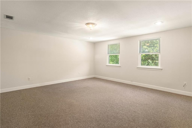 125 Bent Tree Ct, Covington, LA 70433 - carpeted spare room with baseboards and a textured ceiling