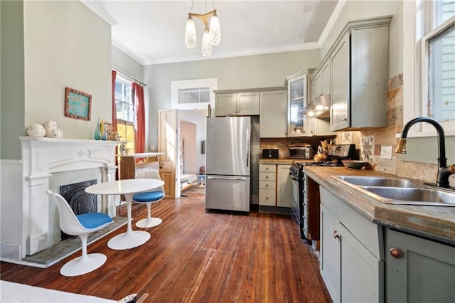 2000 St Philip St, New Orleans, LA 70116 - kitchen with stainless steel appliances, a sink, range hood, crown molding, and gray cabinetry
