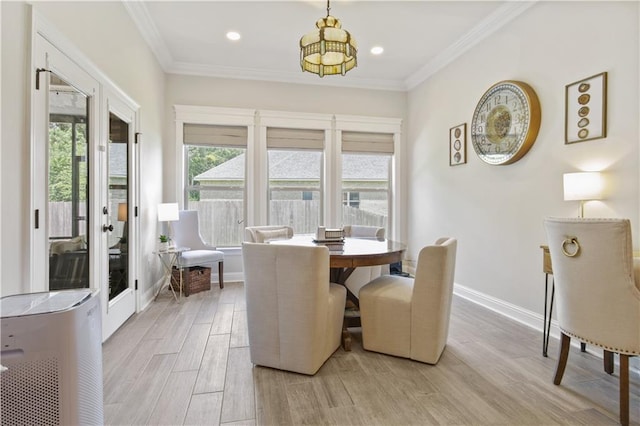 343 Saw Grass Loop, Covington, LA 70435 - dining room with light wood-style flooring, recessed lighting, baseboards, crown molding, and a chandelier