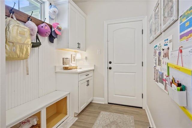 343 Saw Grass Loop, Covington, LA 70435 - mudroom with light wood-style flooring and baseboards