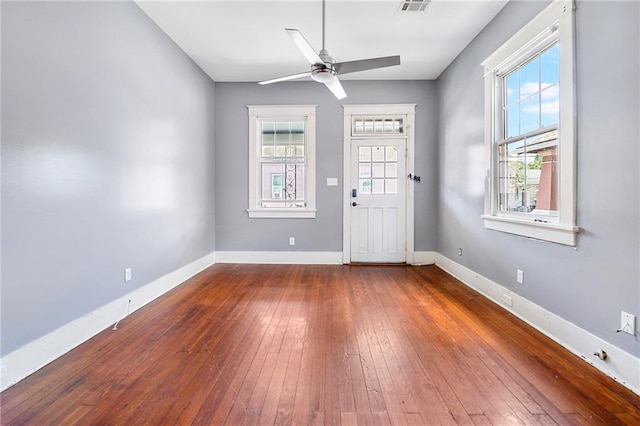 1705-07 Rousselin St, New Orleans, LA 70119 - foyer featuring dark wood-type flooring, plenty of natural light, baseboards, and ceiling fan