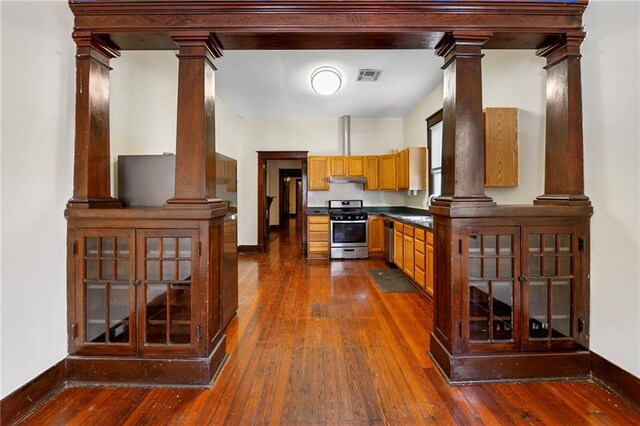 1705-07 Rousselin St, New Orleans, LA 70119 - kitchen featuring stainless steel appliances, dark wood finished floors, and baseboards