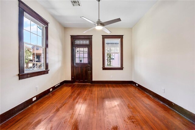 1705-07 Rousselin St, New Orleans, LA 70119 - foyer entrance featuring hardwood / wood-style flooring, baseboards, and a ceiling fan