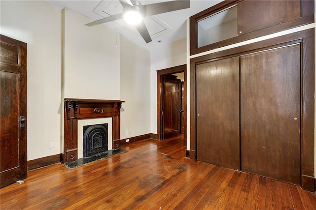 1705-07 Rousselin St, New Orleans, LA 70119 - unfurnished living room with a ceiling fan, hardwood / wood-style floors, baseboards, and a fireplace with flush hearth