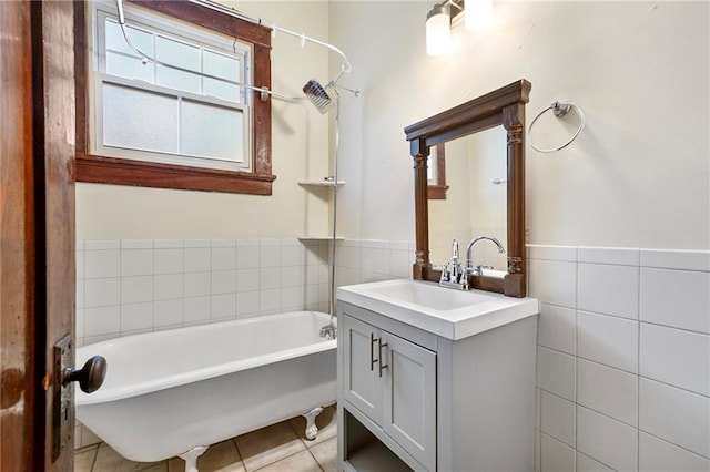1705-07 Rousselin St, New Orleans, LA 70119 - bathroom with a bathtub, tile patterned flooring, vanity, tile walls, and a shower