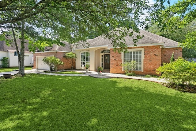 2107 Olvey Dr, Mandeville, LA 70448 - ranch-style house featuring an attached garage, a front lawn, roof with shingles, brick siding, and concrete driveway