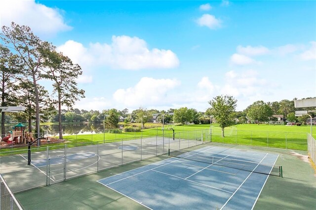 2107 Olvey Dr, Mandeville, LA 70448 - view of tennis court with a water view