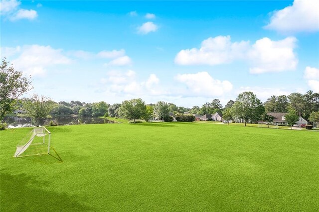 2107 Olvey Dr, Mandeville, LA 70448 - surrounding community with a sport area