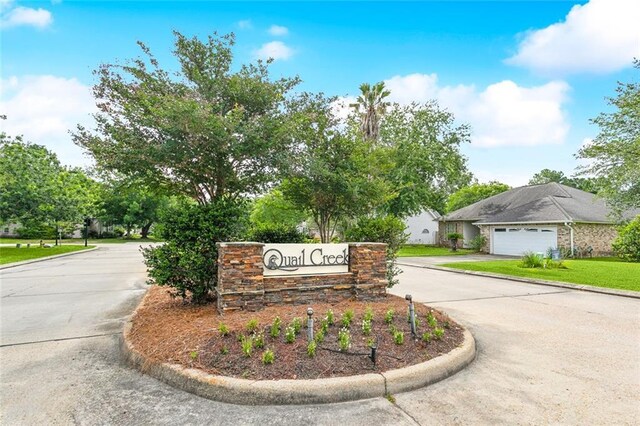 2107 Olvey Dr, Mandeville, LA 70448 - community sign featuring curved driveway