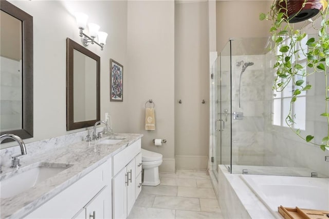 1807 Jena St, New Orleans, LA 70115 - bathroom featuring toilet, a shower stall, marble finish floors, and double vanity