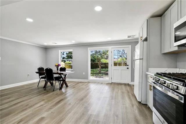 2800 Cupid St, New Orleans, LA 70131 - dining room with crown molding, recessed lighting, baseboards, and light wood-style floors