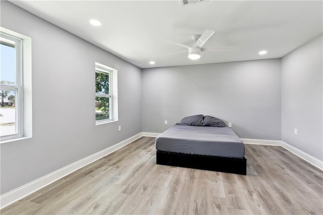 2800 Cupid St, New Orleans, LA 70131 - bedroom with wood finished floors, baseboards, recessed lighting, and a ceiling fan