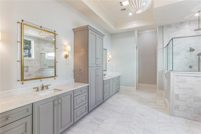 204 Vincent Ave, Metairie, LA 70005 - bathroom with marble look tile flooring, a stall shower, crown molding, two vanities, and a chandelier