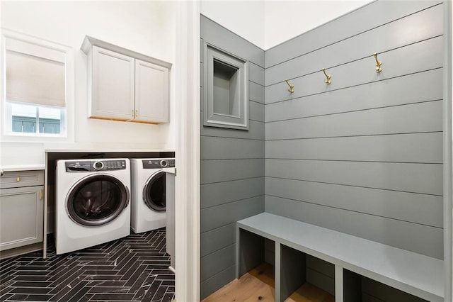 204 Vincent Ave, Metairie, LA 70005 - laundry area with washer and clothes dryer, cabinet space, and brick patterned floors