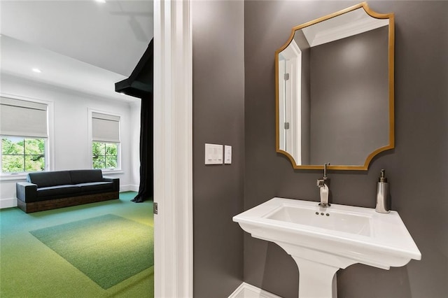 204 Vincent Ave, Metairie, LA 70005 - bathroom with baseboards, recessed lighting, and a sink