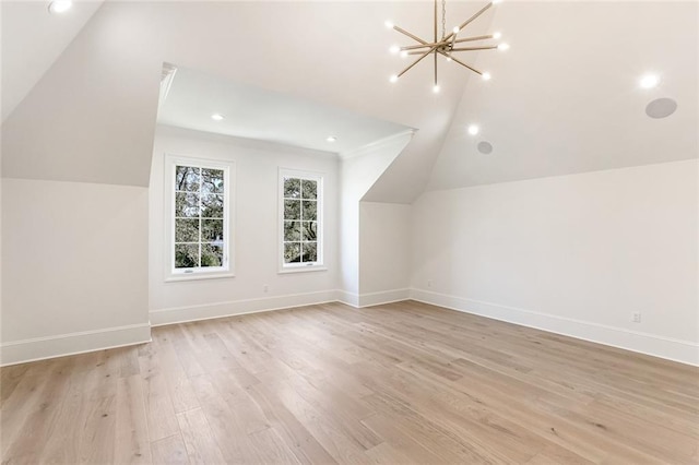 204 Vincent Ave, Metairie, LA 70005 - bonus room with vaulted ceiling, a chandelier, light wood finished floors, recessed lighting, and baseboards