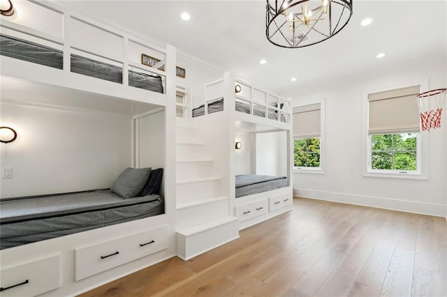 204 Vincent Ave, Metairie, LA 70005 - mudroom with recessed lighting, a chandelier, wood finished floors, baseboards, and built in shelves