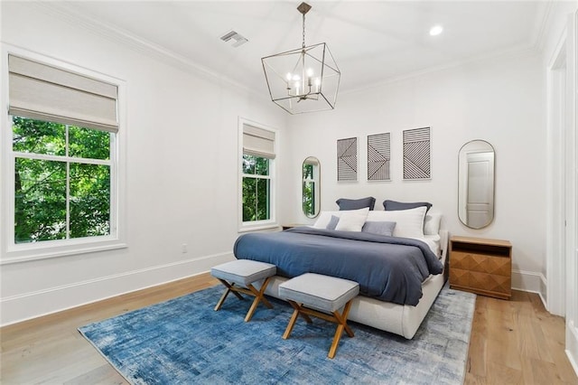 204 Vincent Ave, Metairie, LA 70005 - bedroom featuring a chandelier, baseboards, light wood finished floors, crown molding, and recessed lighting