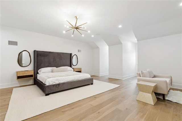 204 Vincent Ave, Metairie, LA 70005 - bedroom featuring a chandelier, vaulted ceiling, baseboards, light wood-style floors, and recessed lighting