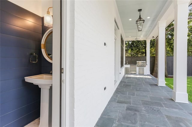 204 Vincent Ave, Metairie, LA 70005 - view of patio / terrace featuring fence and exterior kitchen