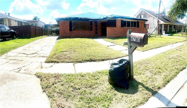 4710 Knight Dr, New Orleans, LA 70127 - view of front of home with brick siding and driveway