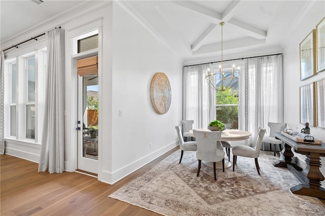 5072 Twin River Pl, Covington, LA 70433 - dining space with a chandelier, baseboards, healthy amount of natural light, wood finished floors, and beam ceiling