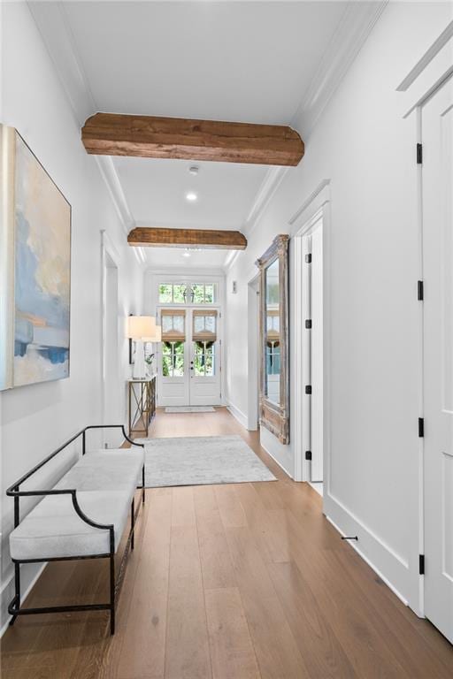 5072 Twin River Pl, Covington, LA 70433 - hall with wood finished floors, beam ceiling, baseboards, ornamental molding, and french doors