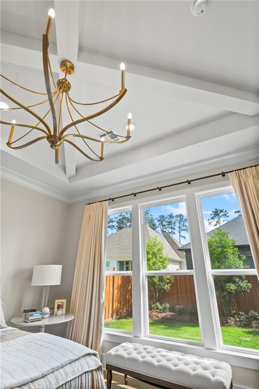 5072 Twin River Pl, Covington, LA 70433 - bedroom with a chandelier