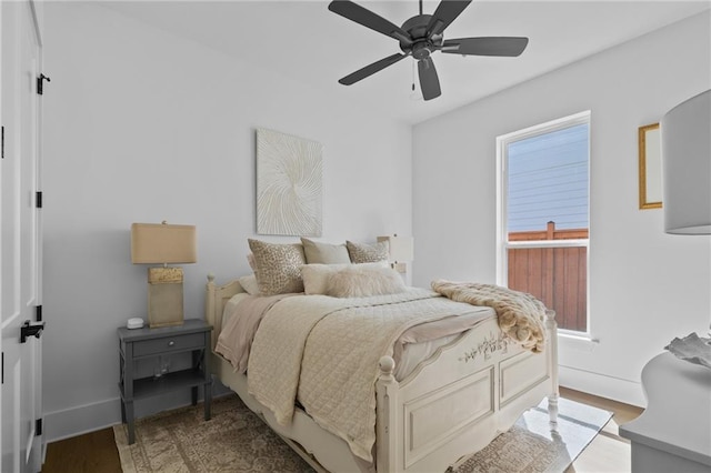 5072 Twin River Pl, Covington, LA 70433 - bedroom featuring wood finished floors, baseboards, and ceiling fan