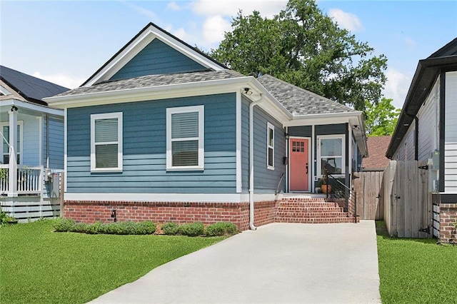 4131 Gibson St, New Orleans, LA 70122 - view of front facade featuring a shingled roof