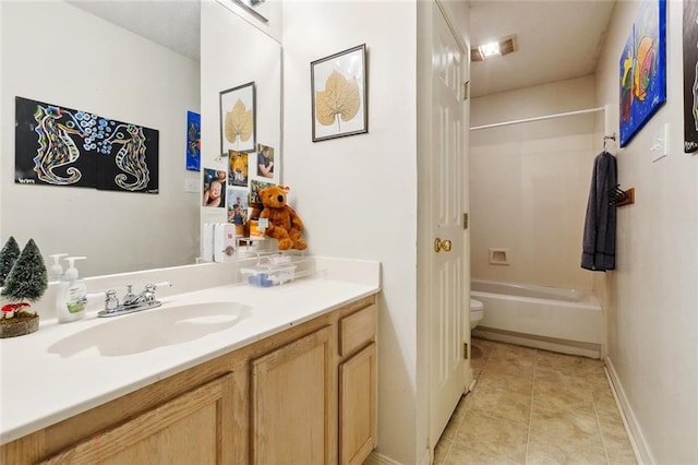 bathroom with tile patterned flooring, vanity, toilet, bathtub / shower combination, and baseboards