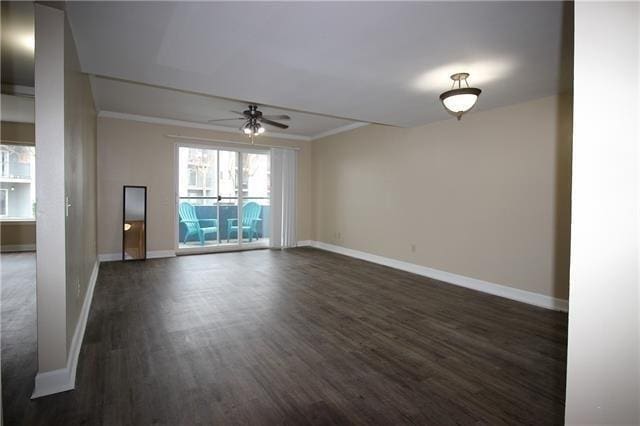 1580 Harbor Dr Unit 127, Slidell, LA 70458 - unfurnished room featuring ceiling fan, dark wood-style floors, baseboards, and ornamental molding