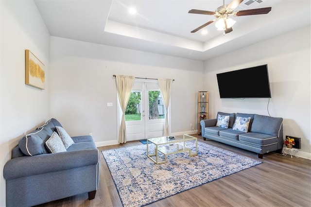 3225 Delaware Ave, Kenner, LA 70065 - living area with ceiling fan, wood finished floors, baseboards, recessed lighting, and a raised ceiling