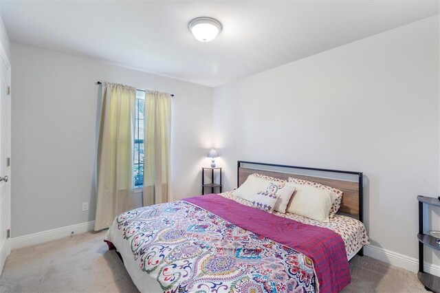 3225 Delaware Ave, Kenner, LA 70065 - carpeted bedroom with baseboards