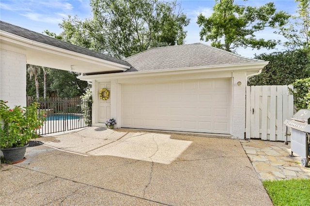 137 Lakewood Estates Dr, New Orleans, LA 70131 - garage with fence and concrete driveway