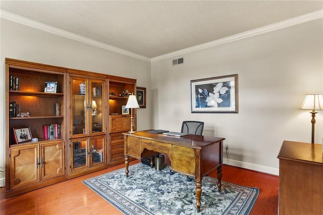 137 Lakewood Estates Dr, New Orleans, LA 70131 - home office featuring crown molding, wood finished floors, baseboards, and a textured ceiling