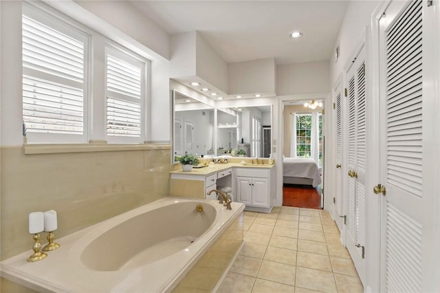 137 Lakewood Estates Dr, New Orleans, LA 70131 - full bathroom with a bath, vanity, a closet, tile patterned flooring, and recessed lighting