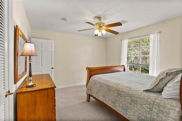 137 Lakewood Estates Dr, New Orleans, LA 70131 - carpeted bedroom featuring a textured ceiling, baseboards, and a ceiling fan