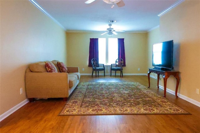 1513 Mason Smith Ave, Metairie, LA 70003 - living room with ornamental molding, ceiling fan, wood finished floors, and baseboards