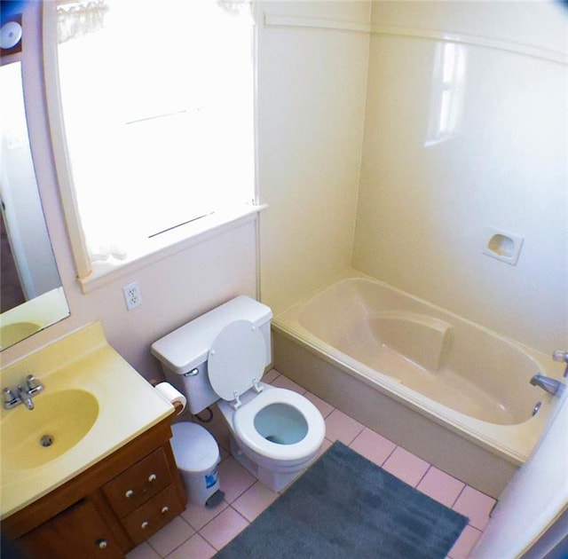 1513 Mason Smith Ave, Metairie, LA 70003 - full bathroom featuring tile patterned floors, toilet, vanity, and plenty of natural light