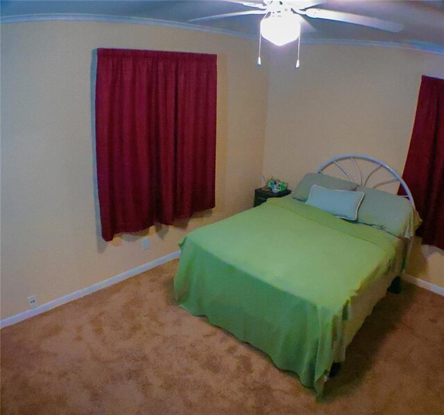 1513 Mason Smith Ave, Metairie, LA 70003 - bedroom with ornamental molding, baseboards, carpet flooring, and ceiling fan