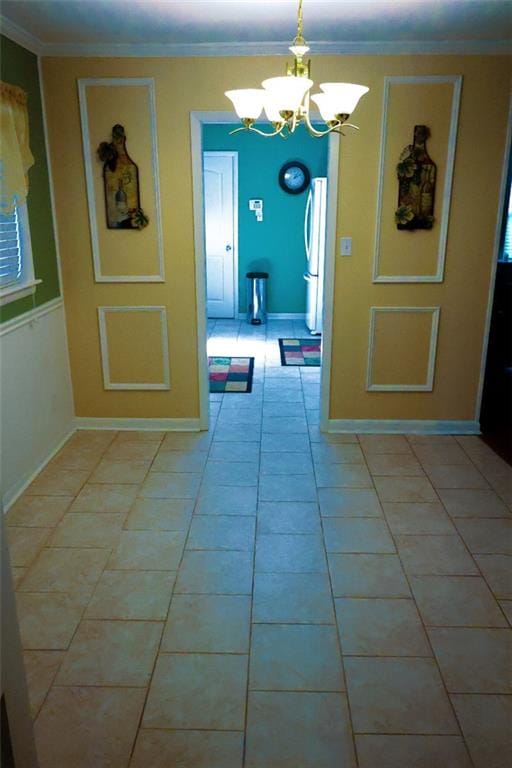 1513 Mason Smith Ave, Metairie, LA 70003 - hall featuring a chandelier, crown molding, and light tile patterned flooring