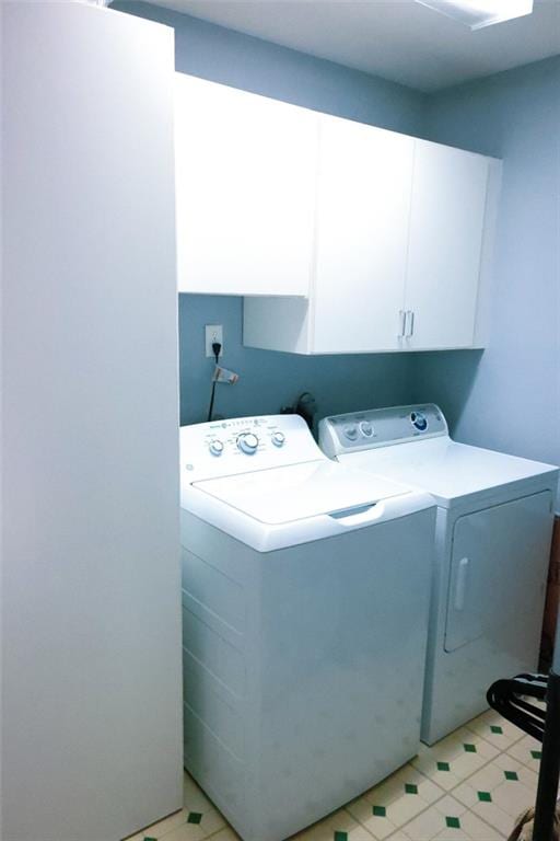 1513 Mason Smith Ave, Metairie, LA 70003 - laundry room featuring cabinet space and washer and dryer