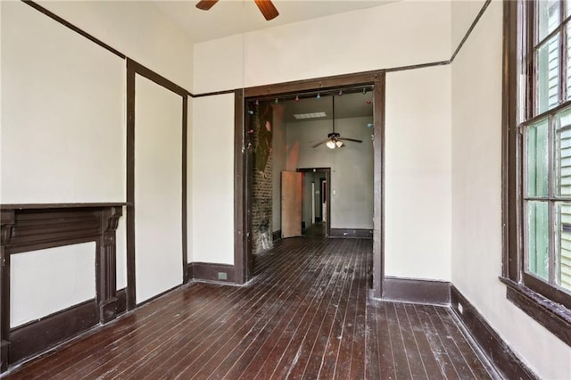 271214 Burgundy St, New Orleans, LA 70117 - unfurnished room with a ceiling fan, hardwood / wood-style floors, and plenty of natural light