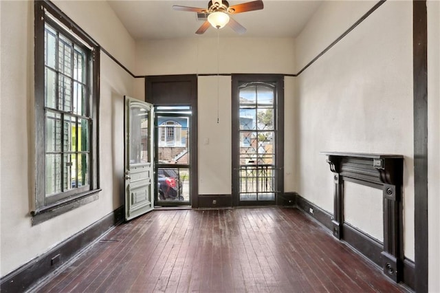 271214 Burgundy St, New Orleans, LA 70117 - entrance foyer featuring dark wood finished floors and ceiling fan