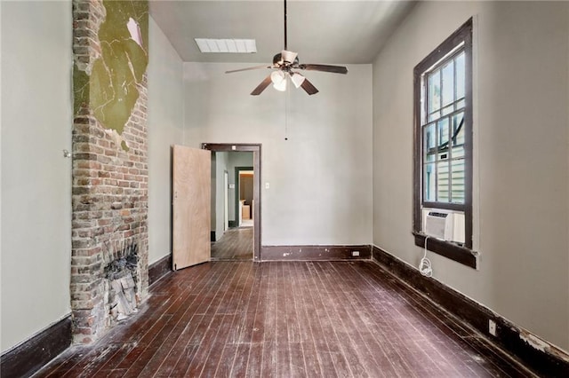 271214 Burgundy St, New Orleans, LA 70117 - unfurnished living room featuring ceiling fan, hardwood / wood-style flooring, and a fireplace