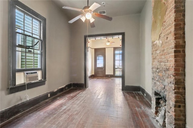 271214 Burgundy St, New Orleans, LA 70117 - foyer with wood-type flooring, a ceiling fan, and cooling unit