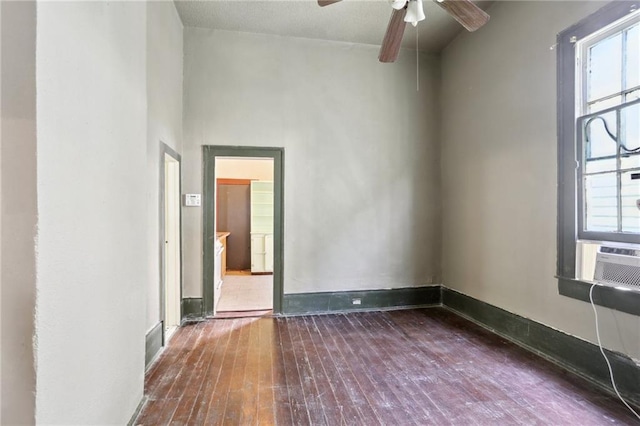 271214 Burgundy St, New Orleans, LA 70117 - spare room with hardwood / wood-style floors, ceiling fan, and healthy amount of natural light