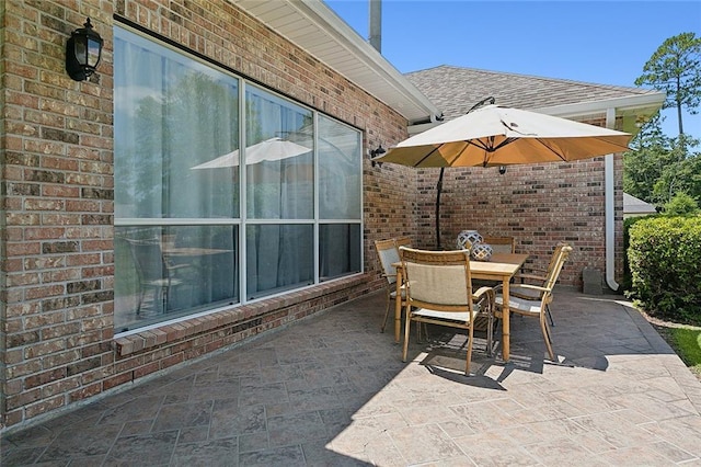 31057 Woodland Dr, Lacombe, LA 70445 - view of patio / terrace with outdoor dining area