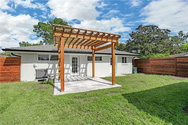 9004 Camille Ct, River Ridge, LA 70123 - rear view of property featuring a pergola, a patio, and cooling unit
